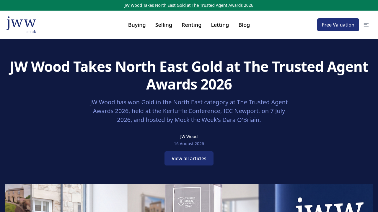 JW Wood celebrating their Trusted Agent 2026 win